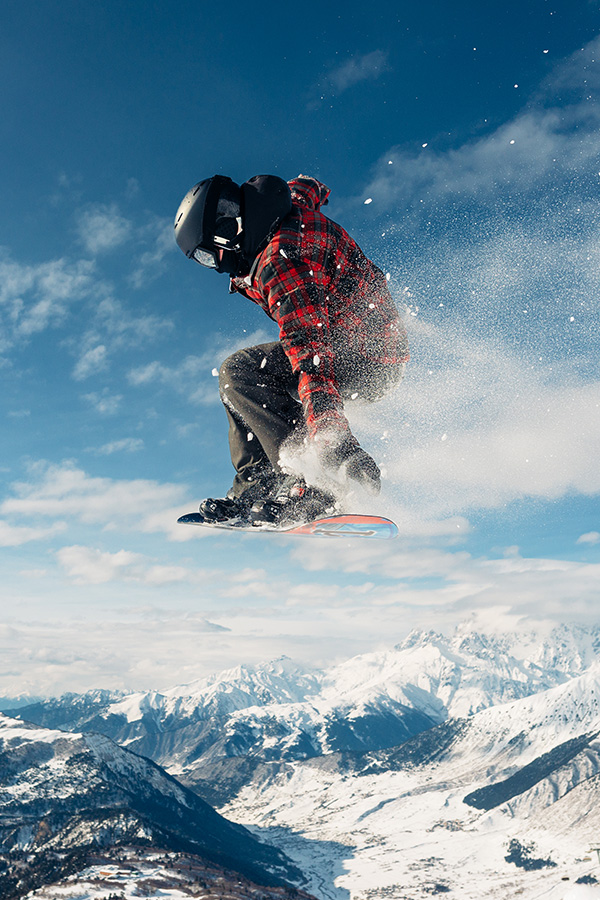 snowboarder-is-jumping-with-snowboard-from-snow-mo-6PZUM9Aq