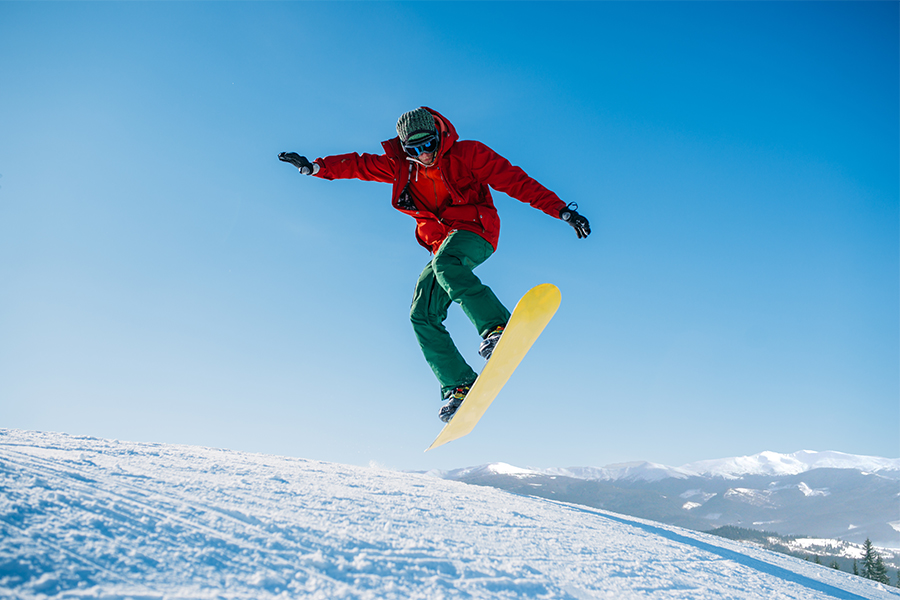 snowboarder-makes-a-jump-on-speed-slope-PU98DJMm